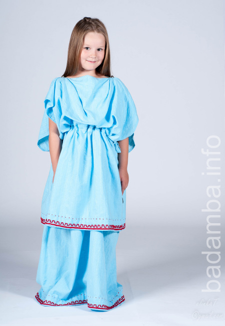 A little girl in blue dress